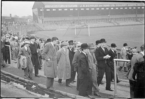 Football crowds leave Burnden Park after watching Bolton Wanderers reserve team play, September 25th 1937