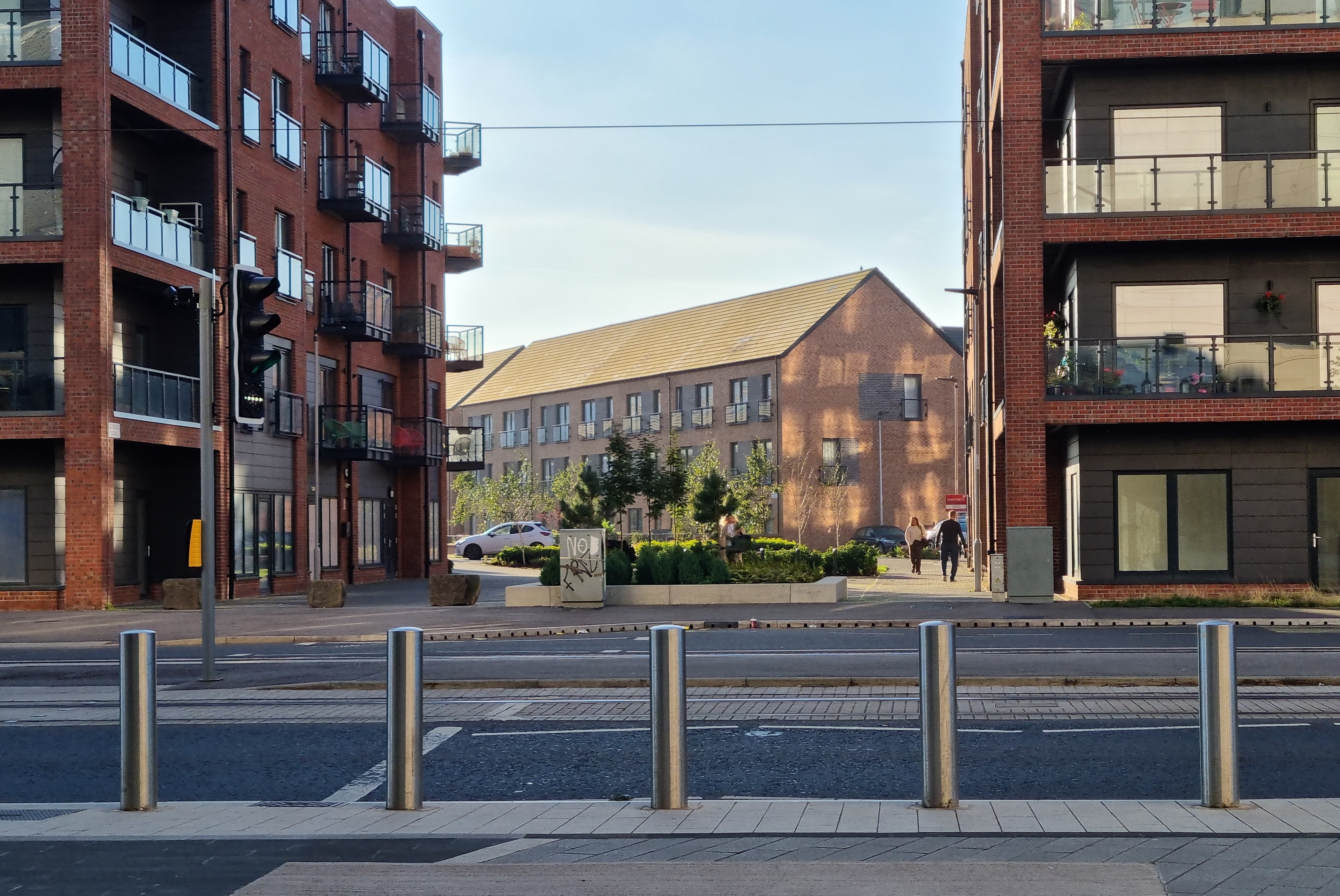 Evening sunshine reflects onto modern blocks of flats