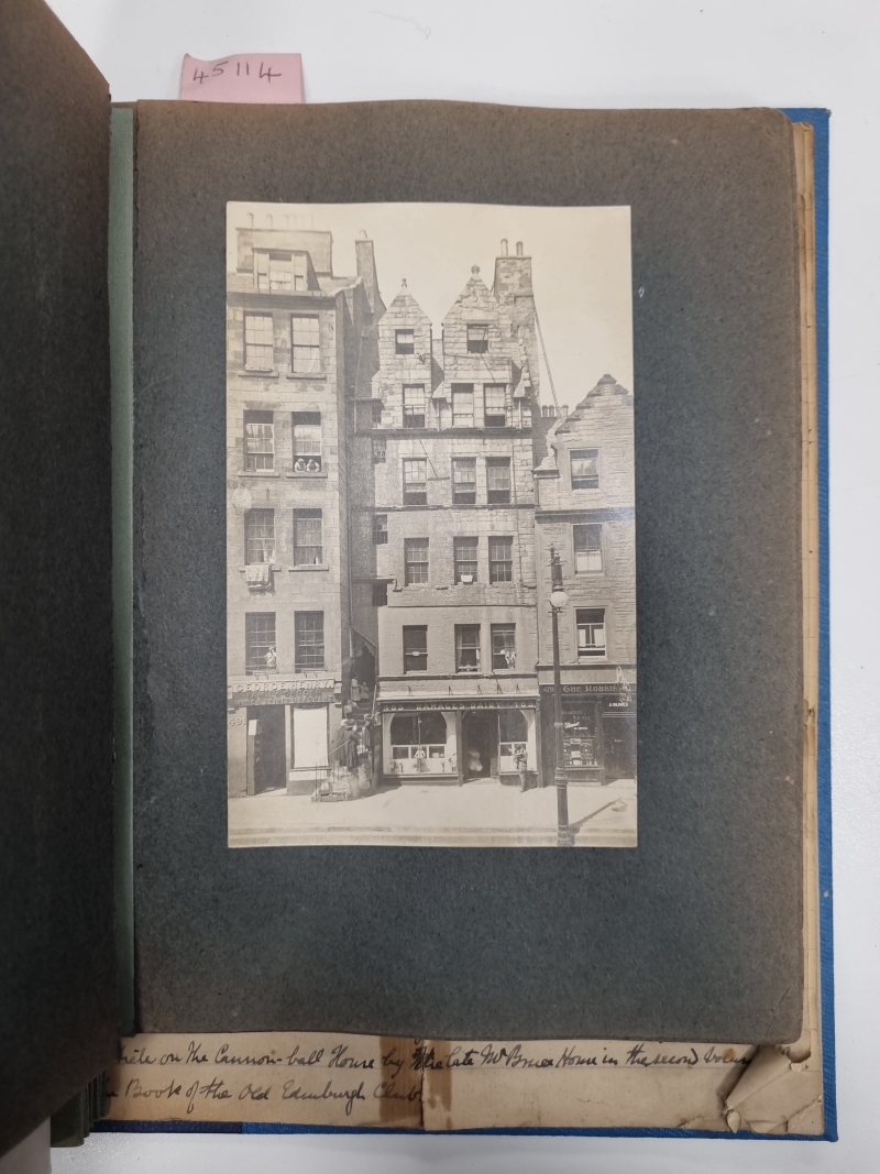 A page from an album showing a plate of Gladstone's Land, an ancient stone tenement in the Edinburgh Old Town.