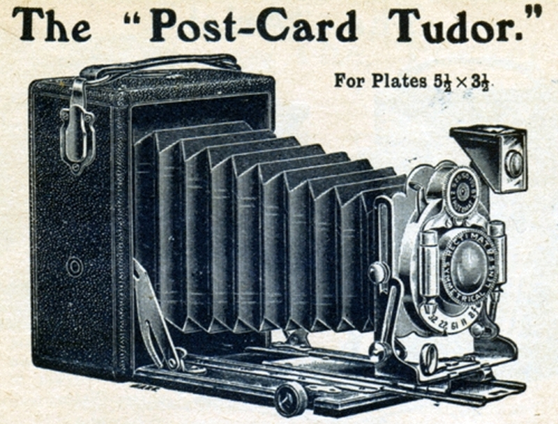 A handheld bellows camera depicted in an advertisement from before the First World War.